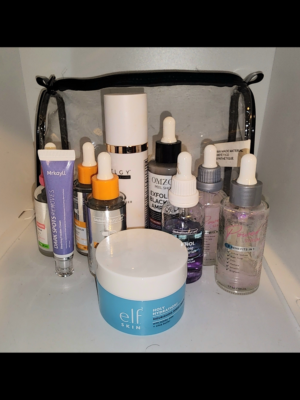 large lot of assorted open skin care products